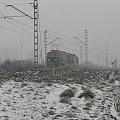 ET22-497 + ET22-338 w mglisty grudniowy dzień jadą w kierunku Kochłowic.